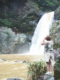 Local guy doing acrobatics over the waterfall at Jarabacoa. Photograph (c) Sean Creech 2004