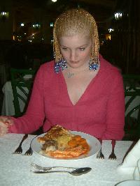 Karolina is wondering why she has 4 forks! Photograph (c) Sean Creech 2004
