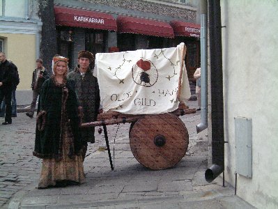 Medieval people pose for a photograph outside Olde Hansa, the Estonian restaurant we visited. Photograph by Karolina Karlsson (c) 2002