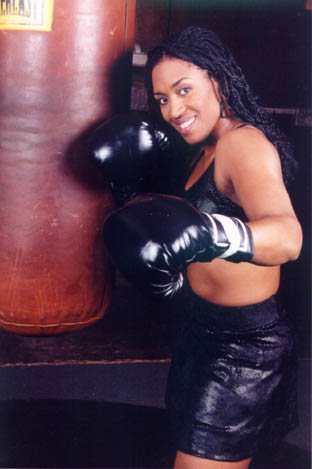 Jackie next to heavy bag...