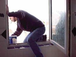 Philip Painting the Outside of the House