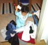 Pulling out our clothes from the laundry basket!