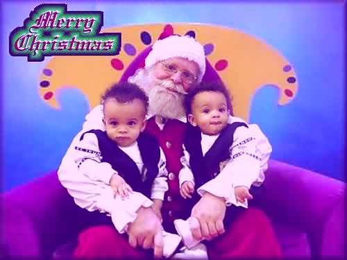 Santa posing with twins