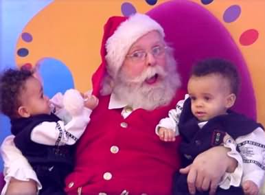 Santa Claus with toddler twins