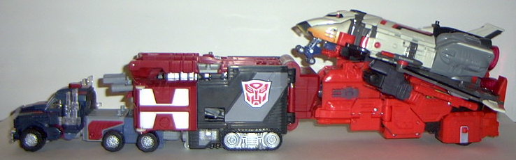 Overload, attached to Powerlinx Prime and carrying Jetfire