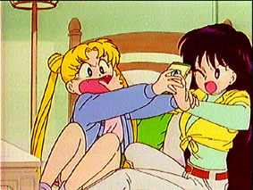 Serena and Raye fight over a Sailor V comic book