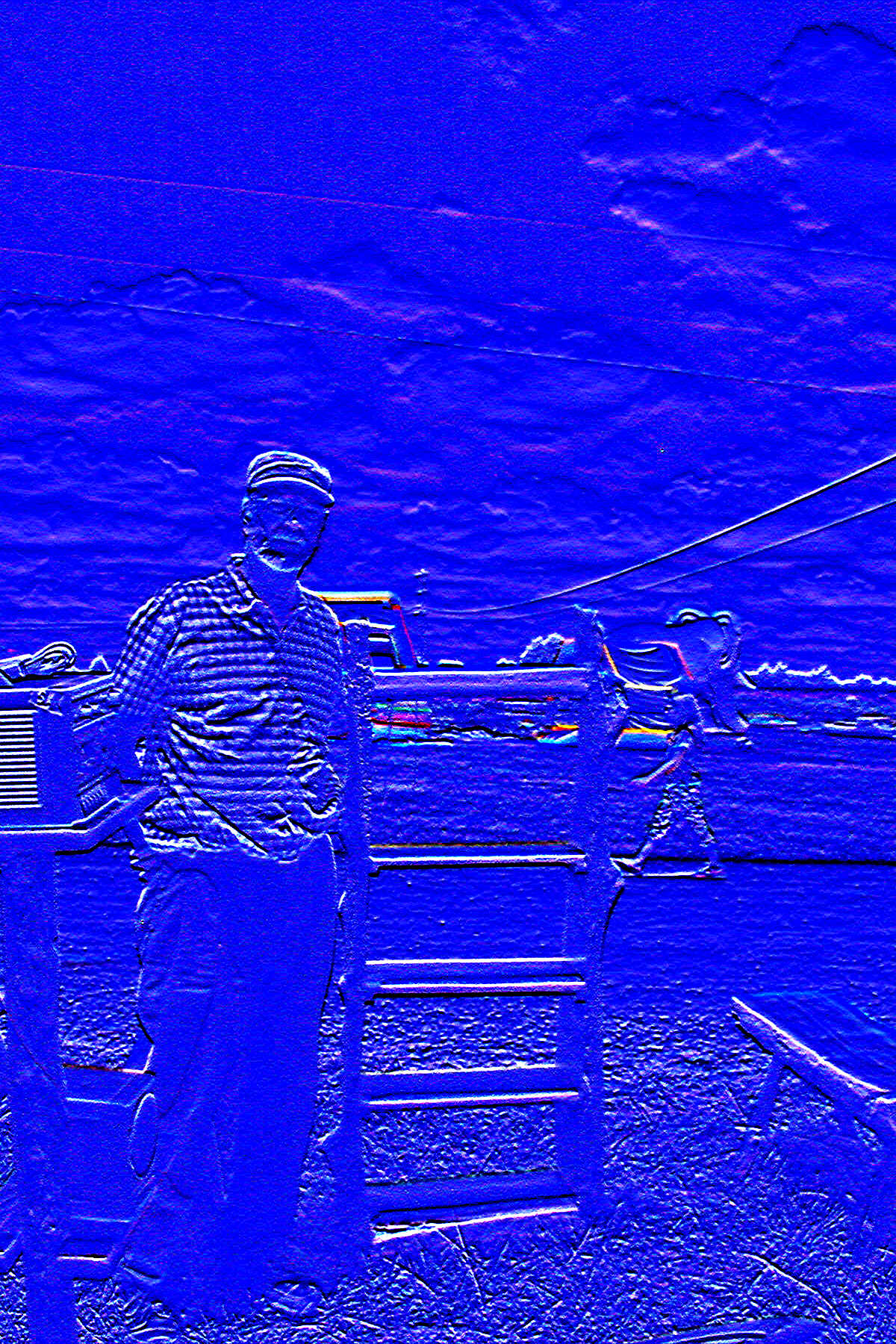 Mike with bookshelf by Tanya Smith