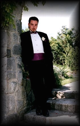 This is me at my friend's wedding in '98.  Click to see another pic of me in a tux.