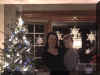 new years_2002_3_tommy_kathy_xmas_tree.JPG (108330 bytes)