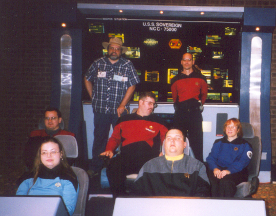 Crew of USS RAVEN on bridge set.