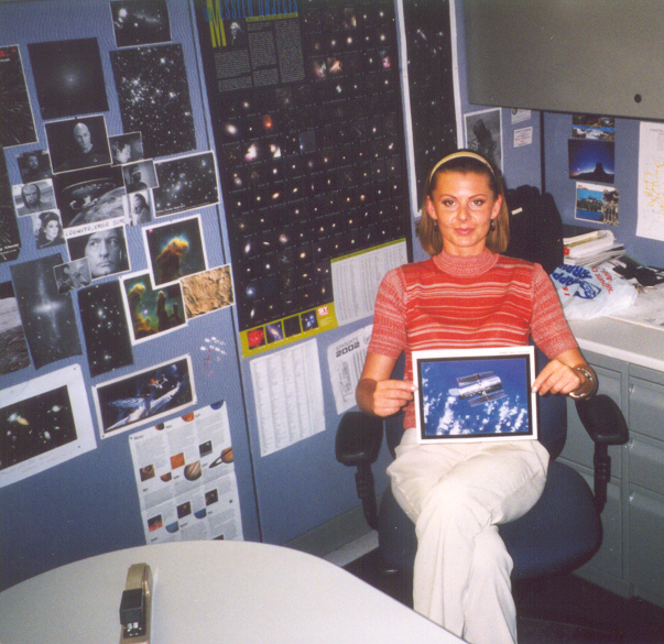 Desk co-worker with Hubble Pic.
