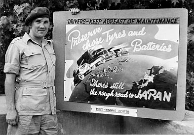 Joseph Cairnes, with his prize-winning poster, 1944(?)