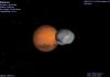 Mars and orbiting satellite Deimos.
