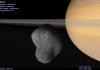 Saturn and shepherd satellite Pan.