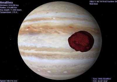 Jupiter and orbiting satellite Amalthea.