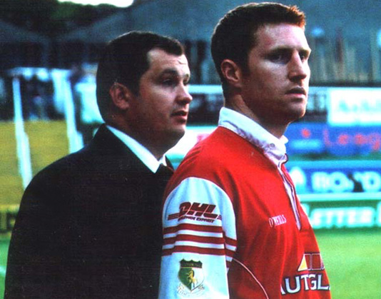 The first substitution: Robbie Griffin receives some final instructions from Dolo before replacing Ger McCarthy in the 39th minute v Derry City 24 Aug 2001
