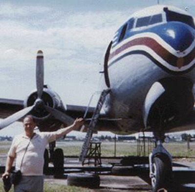 [Bob Smith with DC-4 in the Philippines]