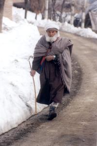 A sturdy Gujar walking home near Yusmarg