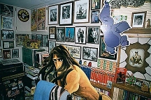 12. Autographed movie stills behind Mike's desk.