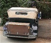 Packard turning into the driveway of Tarzana Ranch Estate