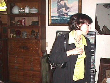Stacy Burroughs admiring the array of antiques
