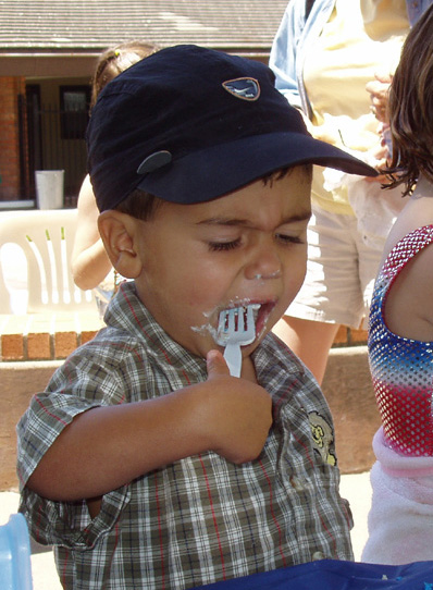 Rico opening gift before Christmas 2002