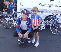 Lance poses with a girl (her sister ran away).