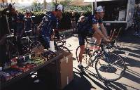 Spare bikes lined up by USPS Team moving van.