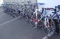 Lance's bike followed by all the other teams bikes.