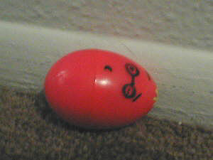 Dave, the boss egg, toppled onto the floor.