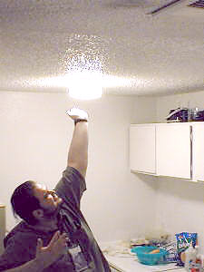 HooveR absorbs his powers from Jennifer's kitchen light.