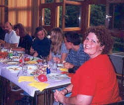 Herr Unger, Frau Knobus, Juliane, Christine, Markus Q., and Frau Gerstacker sample our fare at the Tex-Mex dinner.
