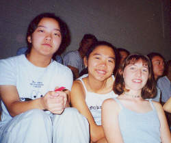 Judy T., Sally, and Allison bask in the warm glow of the gym lights.
