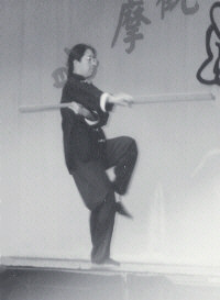 Helen models her $33 outfit and $40 staff.