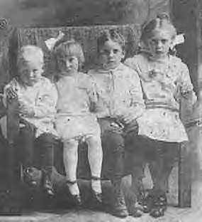 George, Alma Marie, Walter, and Lottie, first four children of Walter and Minnie, taken in Nemaha, Nebraska