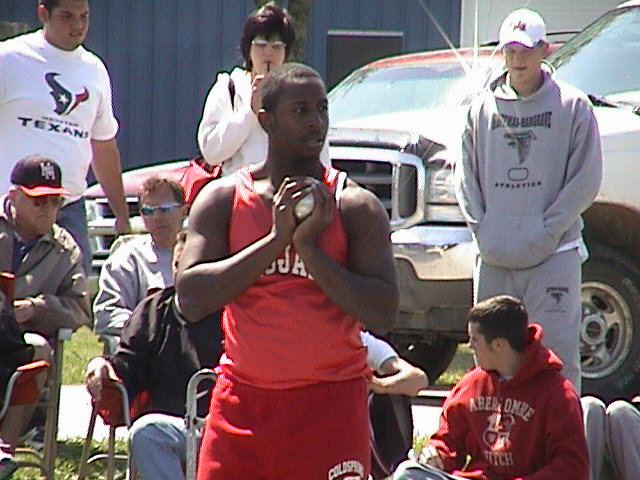 Michael prepares to put the shot