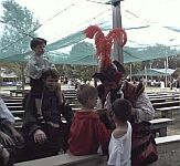 Miguel visits with children before a show.