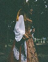 Lady Monica gives instructions to prospective youngsters during a rainy Knighting ceremony on Memorial day.