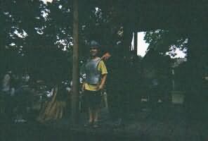 Despite the rain a new knighted knight is presented to the crown.