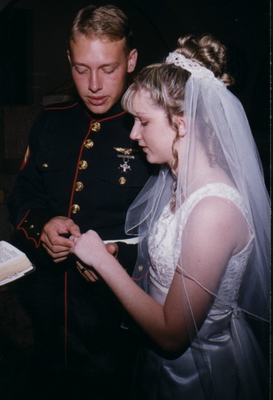 Justin putting the ring on Jamie's finger