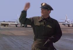 waving on the tarmac