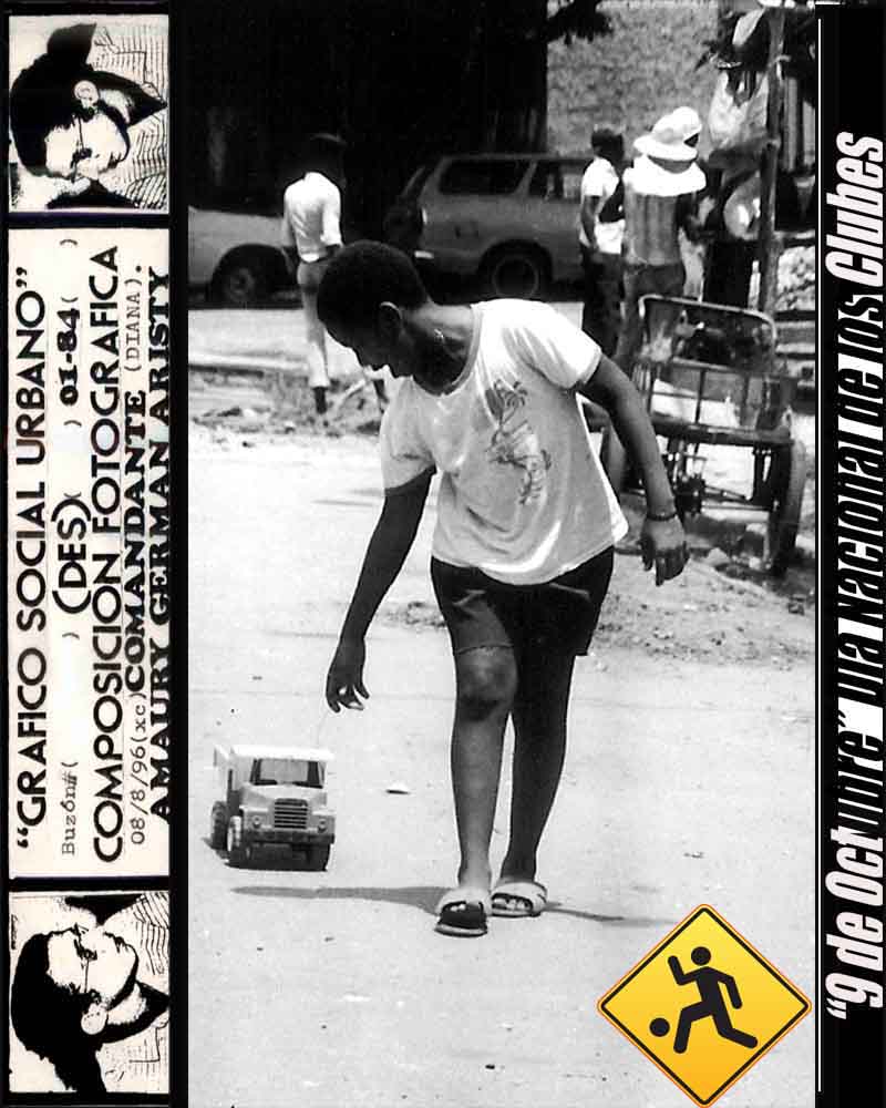 ORIGINAL BLACK AND WHITE "REBUILDING URBAN neighborhoods"= children playing with toy trucks IN THE STREET OF THE BARRIO SAN CARLOS,SDQ.= SEE:public spaces. -OPTICAL: 90:MM TO 230:MM (ZOOM) -FORTMATO?B/N) ;36-8 X10 ON THE WEB-CAMERA SHOT: LONG VERTICAL (DO NOT USE) .PHOTO D:field:FABIO VICTORIA SERRA. -1984.