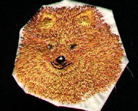 Full pom head in full embroidery