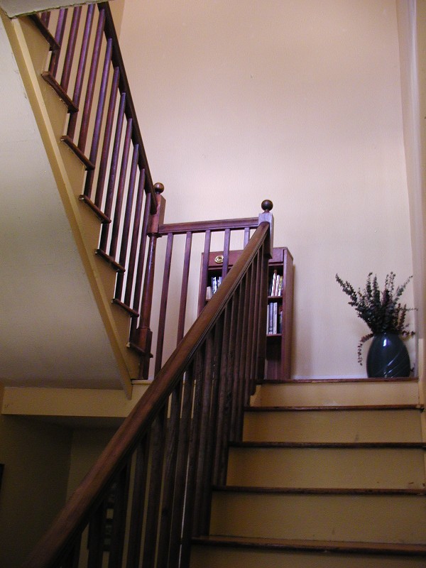 The staircase in the center entrance hall