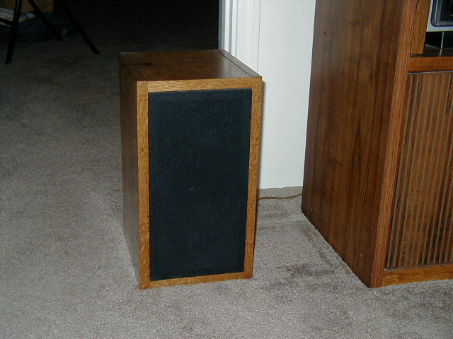 Acoustic suspension speaker with 6 inch LF driver and 1 inch dome.