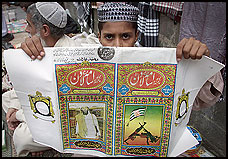 A vendor displays an Osama Bin Laden turban outside a mosque in Islamabad Friday. (09/14/01)