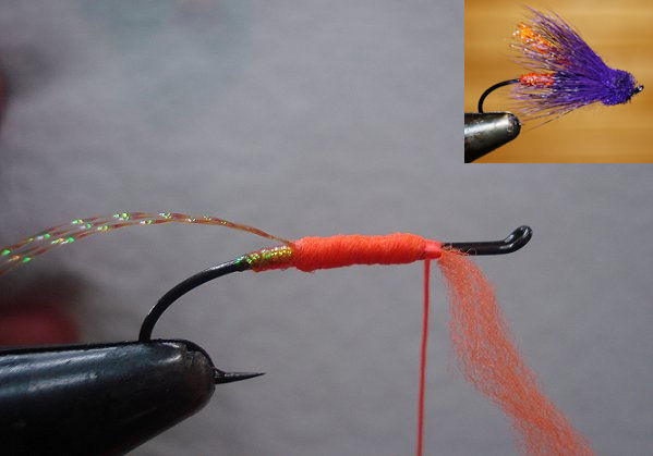 Wrap thread forward towards eye 3/4 way. Wrap flat tinsel forward, small gap between wraps.