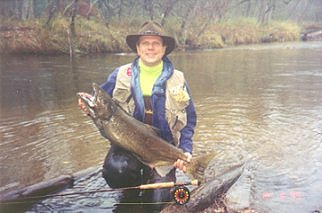 Al Luneckas with a 25# King hen caught (and released) from the Pere 

Marquette river in Michigan