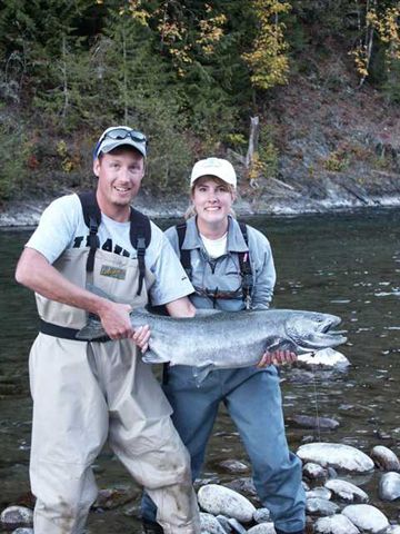Kristine Wimer with her first fly caught Chinook, a 32# hen taken in Southern BC. The ecstatic fisherwoman was swinging a Paint Brush.