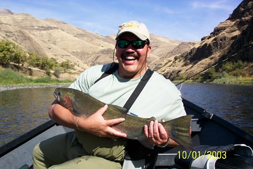 Albuquerque, New Mexico fly fisherman Don Sanchez is into a Steelhead during his trip to the Grande Rhonde in Washington.